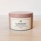 La Romana Signature Travel Tin Scented Candle; Mauve tin with white label and green logo; Coconut Soy Wax and Wood Wick; Dominican Candles; Dominican Republic; Caribbean; Tropical; Hispanic candles; Latino candles; Travel; Tourism; Best Dominican Candles; Dominican Candle Company